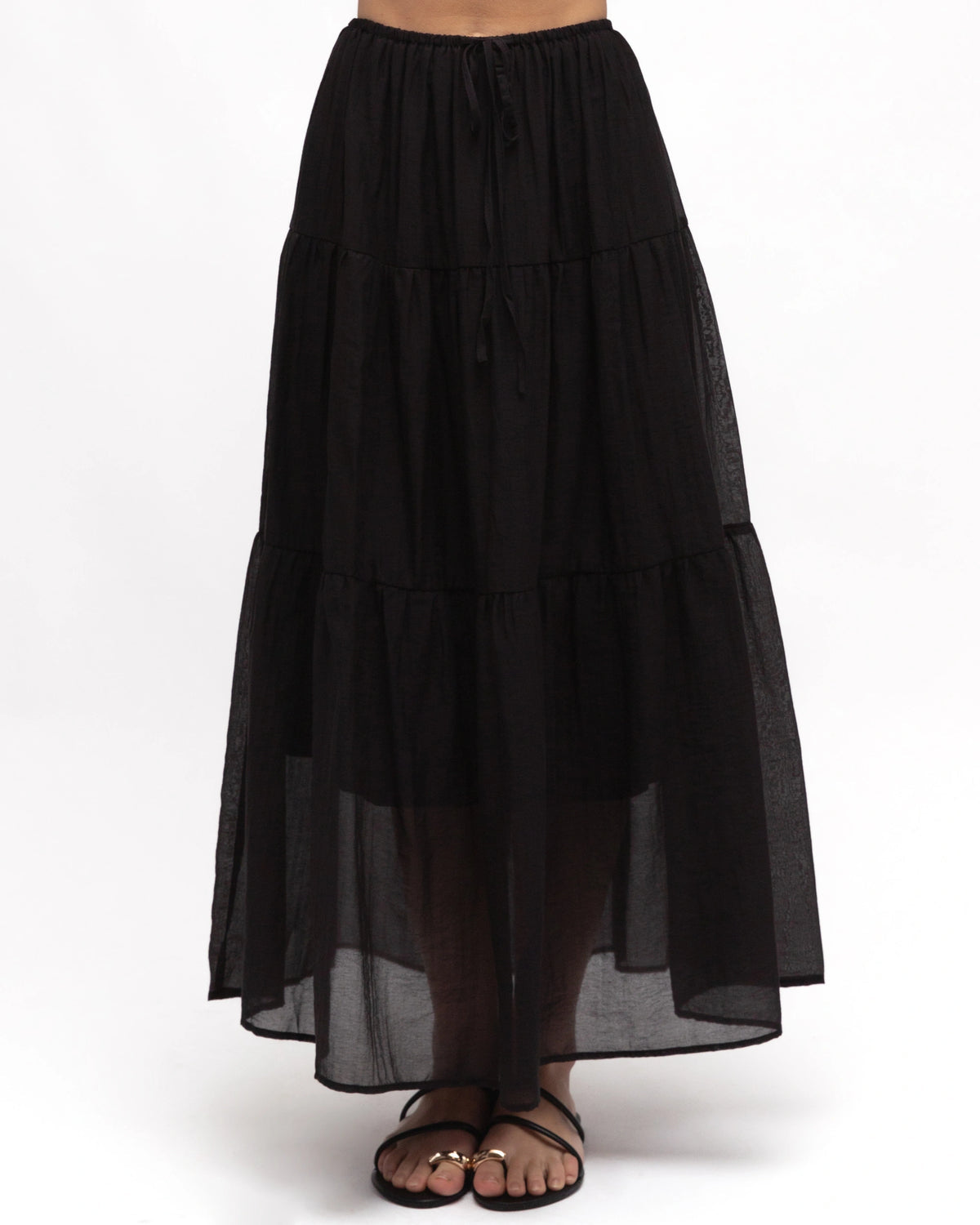Black tiered skirt on a white background
